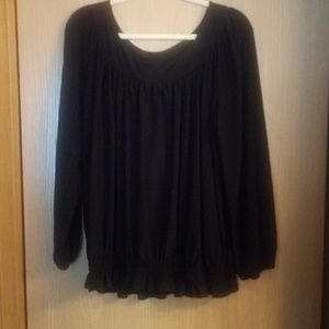 Women's black elastic ruffle bottom shirt